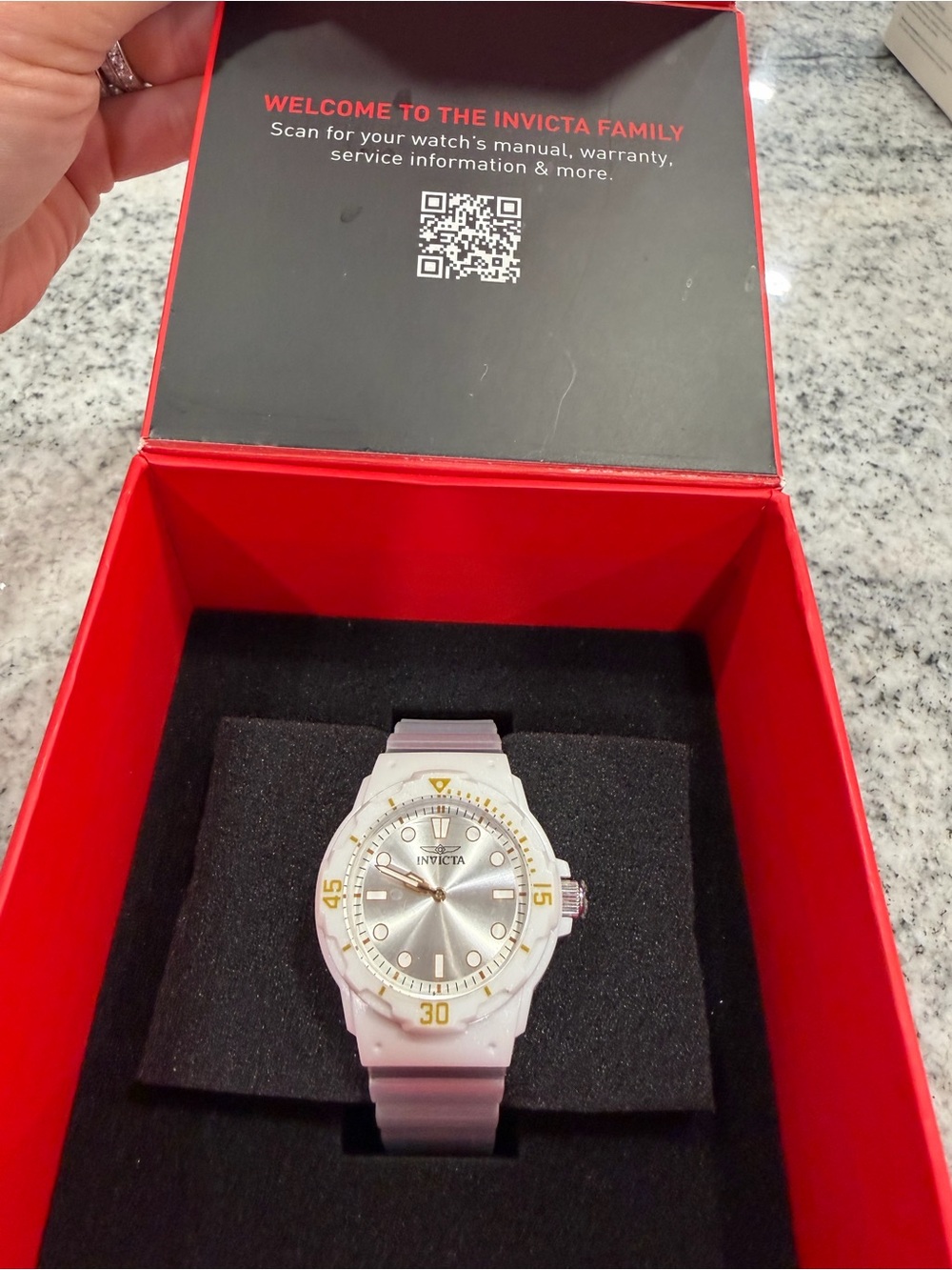 Invicta White and Gold Accent woman’s Sport Watch